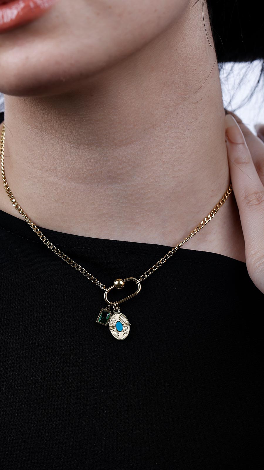 Butterfly with a blue sunstone and a green stone  necklace